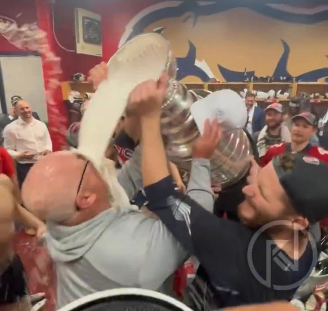 Keith Tkachuk Taking a  Little Sip From The Stanley Cup