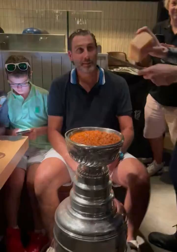 Roberto Luongo is eating pasta straight out of the Stanley Cup