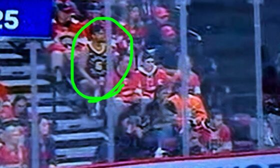Am I crazy, or is this guy wearing a James Johnson jersey at the Stanley Cup Finals?