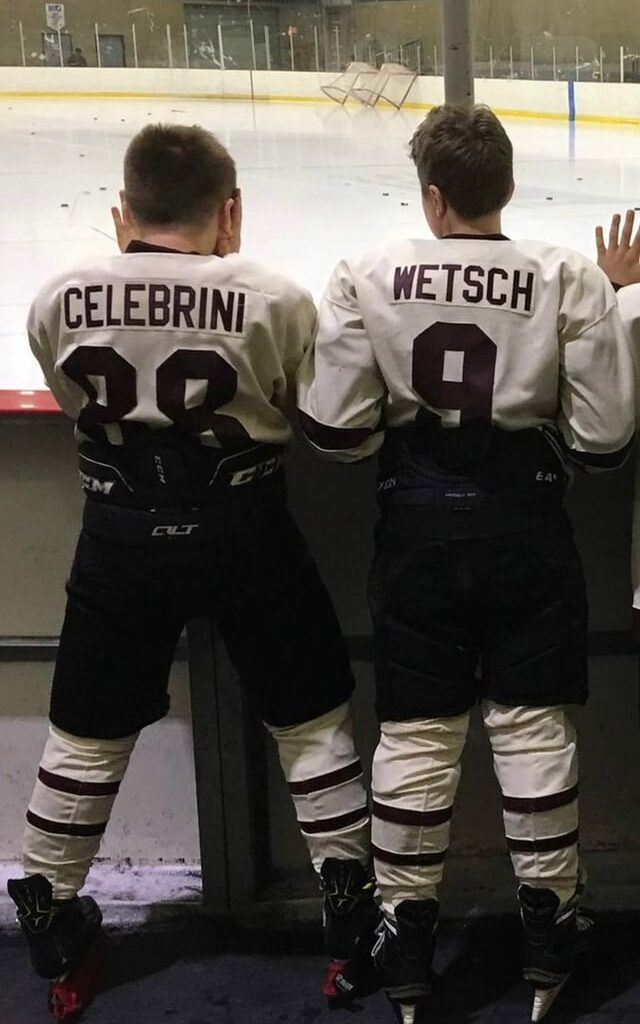 Macklin Celebrini and Carson Wetsch recreating a childhood photo at Sharks Dev Camp