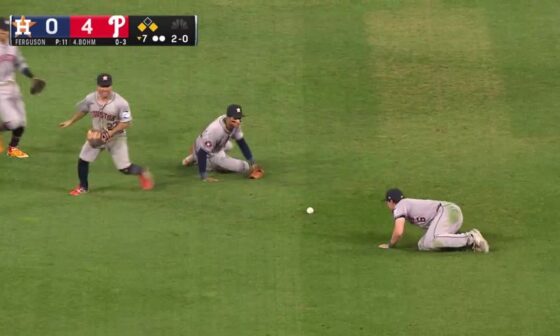 The Astros attempt to catch a ball