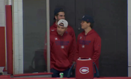 Curious bystanders watching the rookie practice