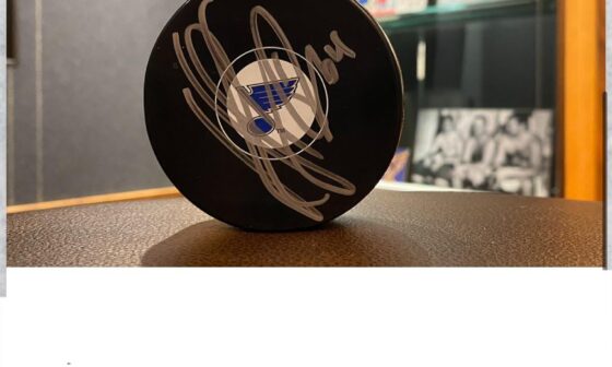 Anyone know who signed this mystery puck?