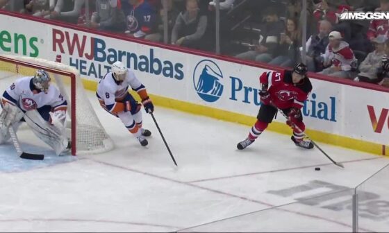 Curtis Lazar scores a goal against the New York Islanders