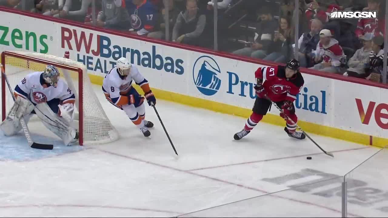 Curtis Lazar scores a goal against the New York Islanders