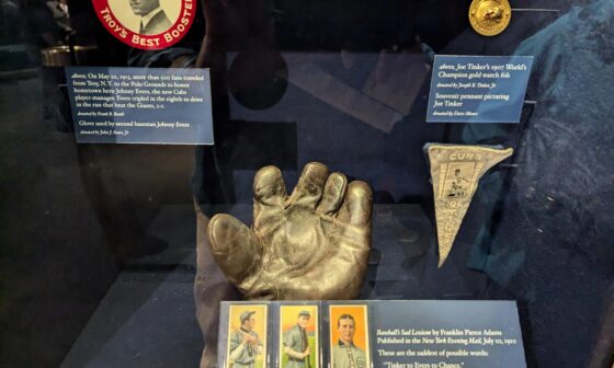 Tinker to Evers to Chance. Current display at Baseball HOF museum