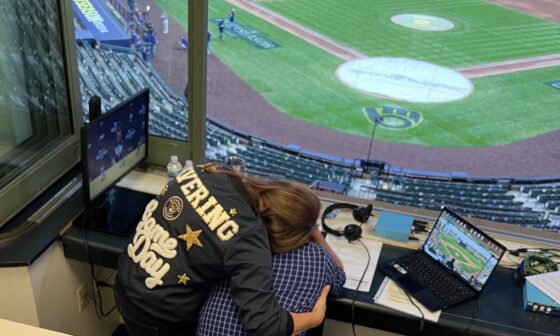 Jeff Levering being comforted after signing off from the radio broadcast last night