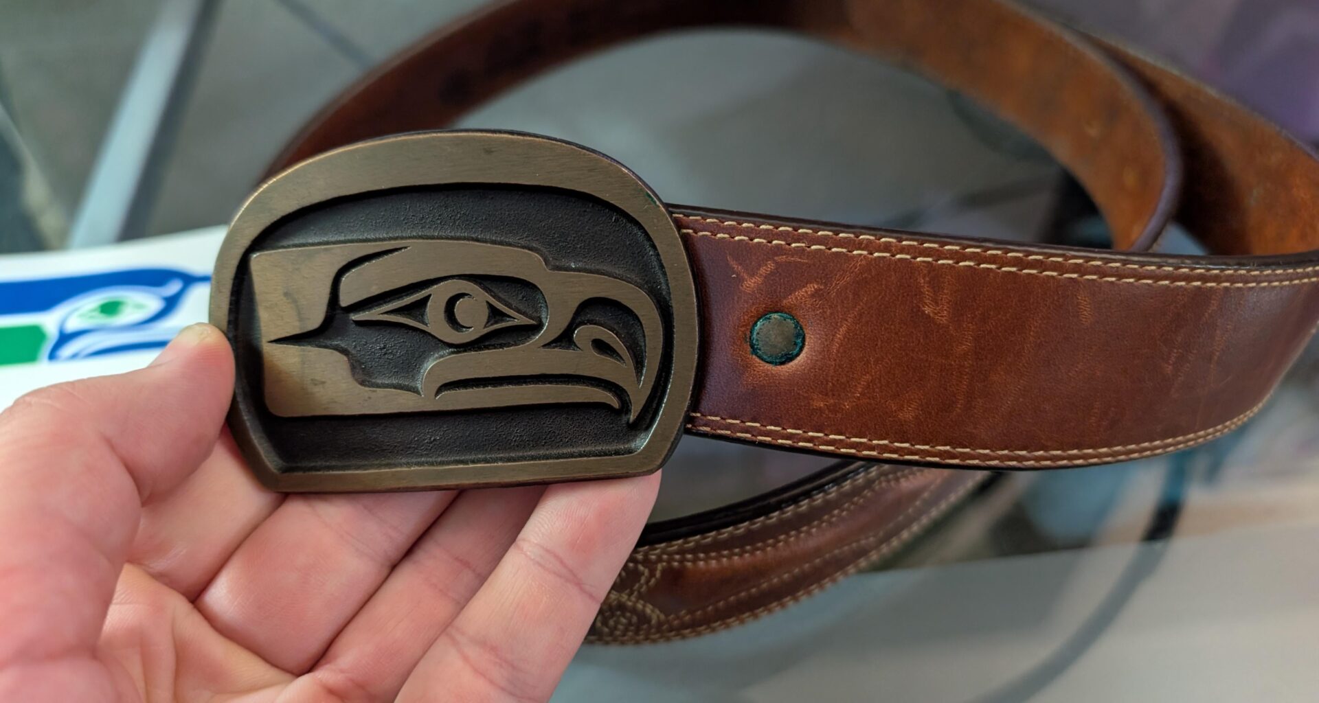 I was clearing out my uncle's storage unit and found this cool vintage Seahawks belt.