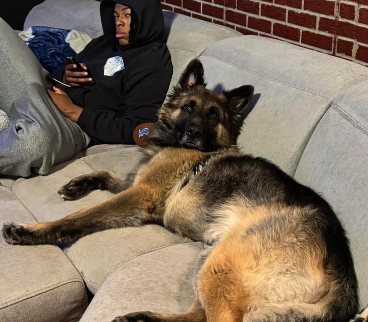 The fastest man alive chillin with his pup after the win last Sunday.