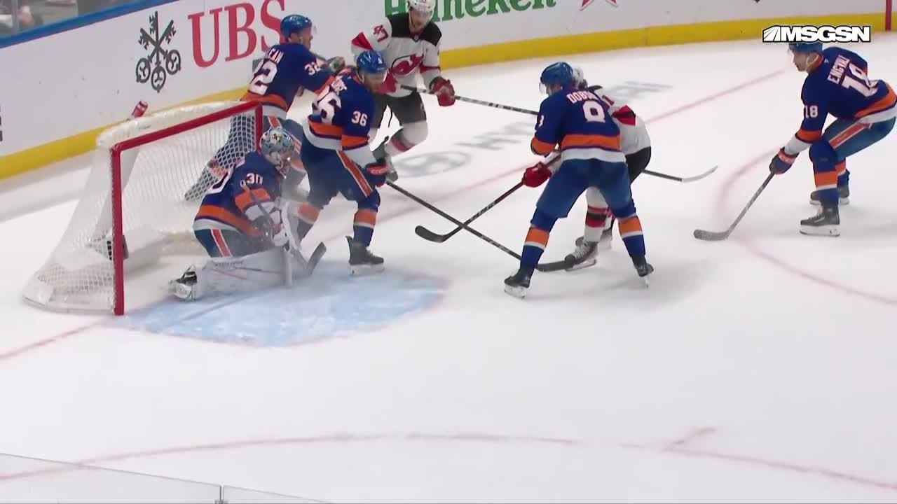 Dawson Mercer scores a goal against the New York Islanders