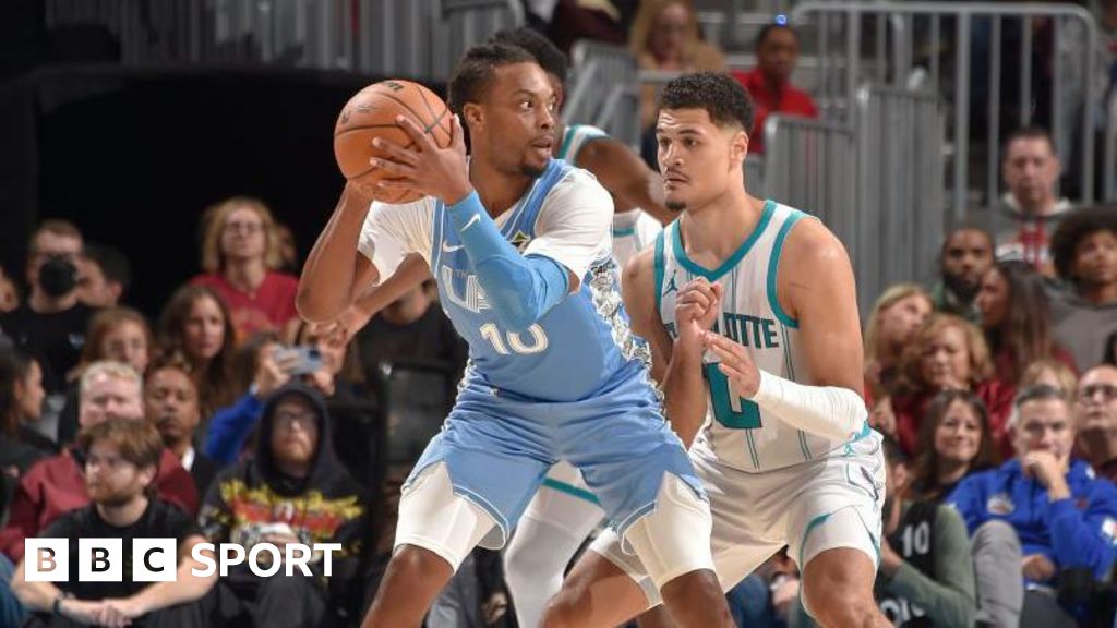 Darius Garland (left) with the ball during the Cleveland Cavaliers' win over the Charlotte Hornets