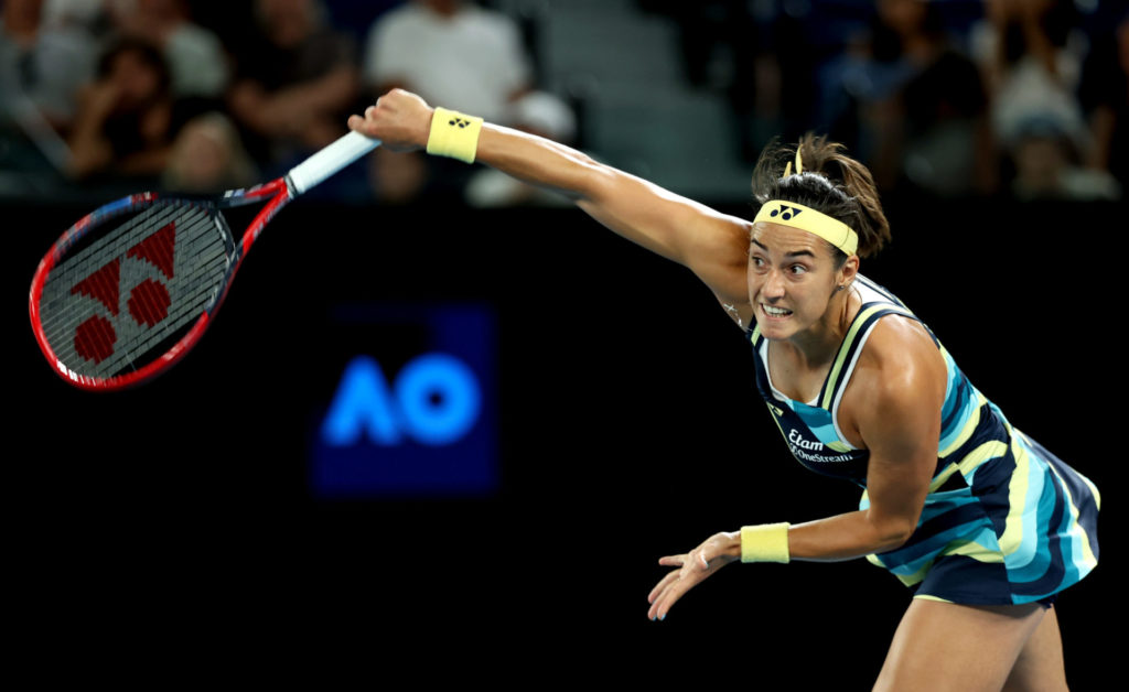 Caroline Garcia of France serves in their round one singles match against Naomi Osaka of Japan during the 2024 Australian Open at Melbourne Park on...