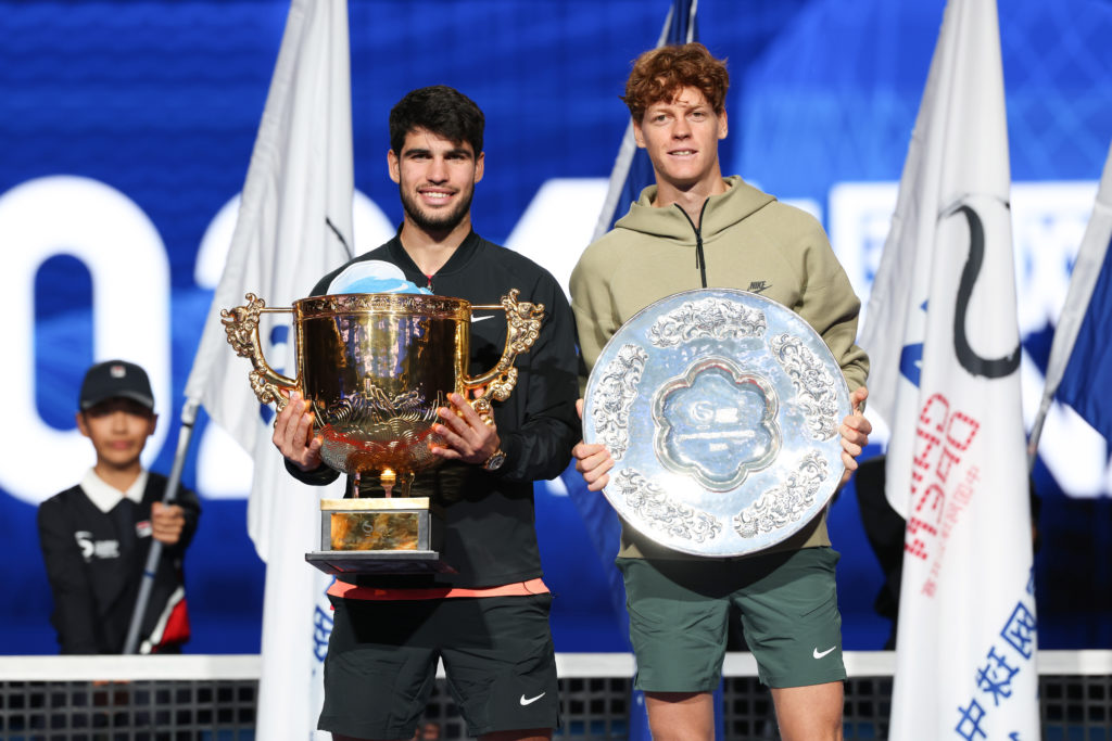 Champion Carlos Alcaraz (L) of Spain and runner-up Jannik Sinner of Italy celebrate after the Men's Singles Final match on day ten of 2024 China Op...