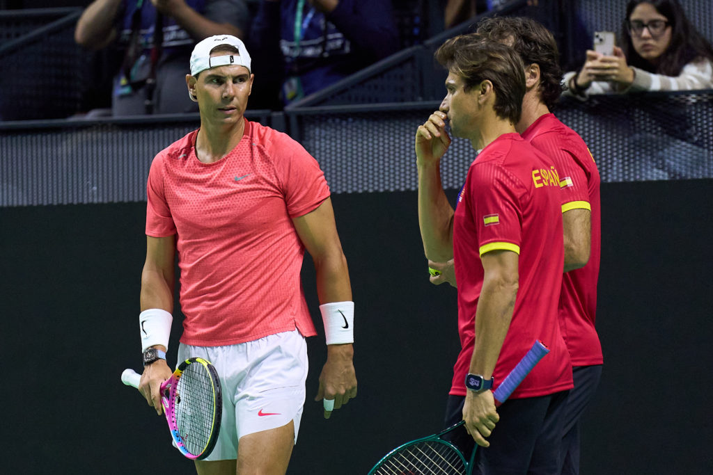 Rafael Nadal of Team Spain interacts with Captain David Ferrer during a practice session ahead of the Davis Cup Final 8 at Palacio de Deportes Jose...