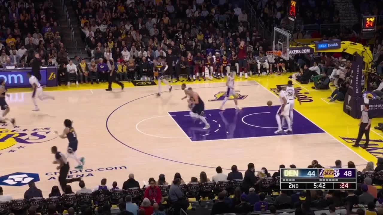 Jokic scores with a volleyball tap on the lob pass