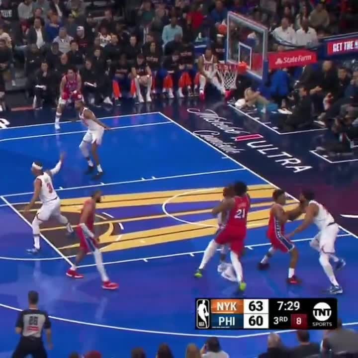 Joel Embiid gets obliterated by a vicious screen