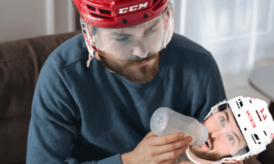 IT'S GAME- Oh sorry Raz, I'll be quiet.  It's gameday!  This is Michael, rasmus's son.  He's feeding him milk just like he's going to feed the red wings 7 goals tonight.  Go flames!