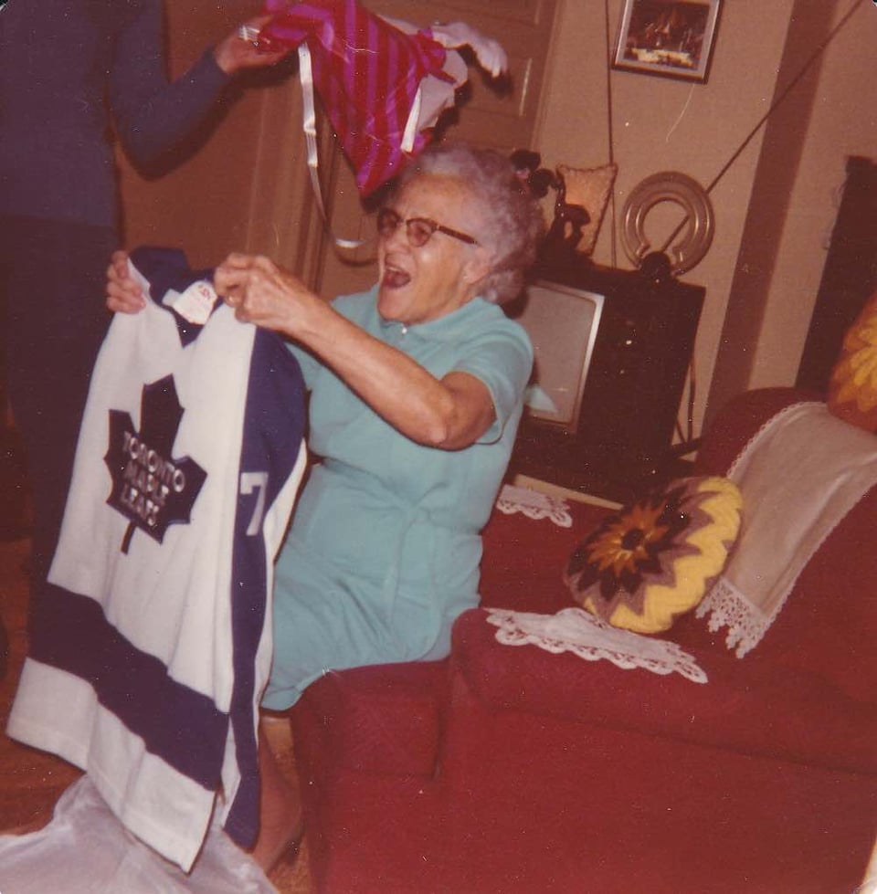 My Great Grandma around 1975 getting her crush's jersey.