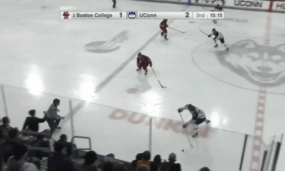 Boston College’s goalie throws a blocker punch after a UConn forward collides with him after scoring