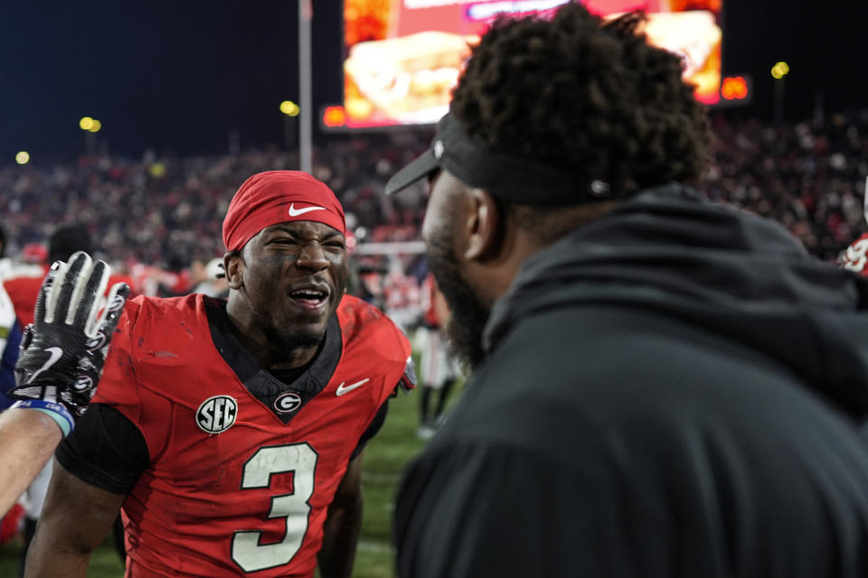 Georgia running back Nate Frazier celebrates after scoring the game-winning two-point conversion against Georgia Tech. (AP Photo/Mike Stewart)