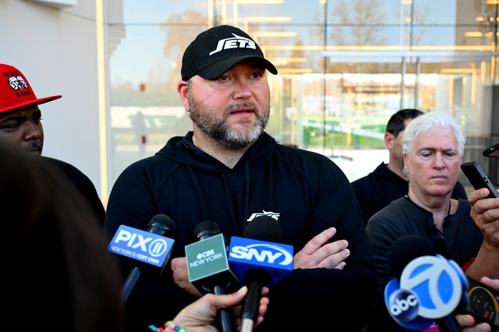 Jets general manager Joe Douglas speaks to the media