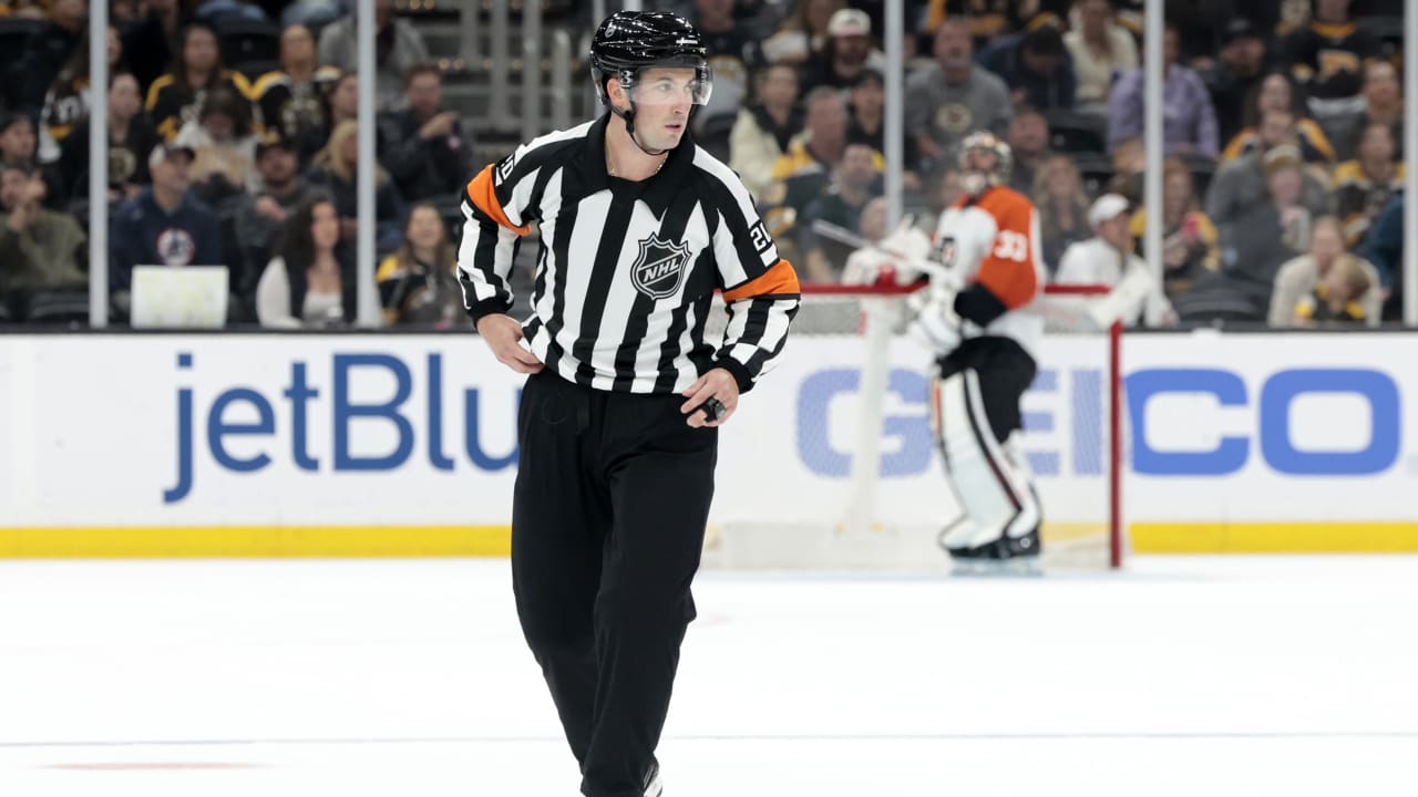 Referee Dunning taken from ice on stretcher during Avalanche win against Flyers