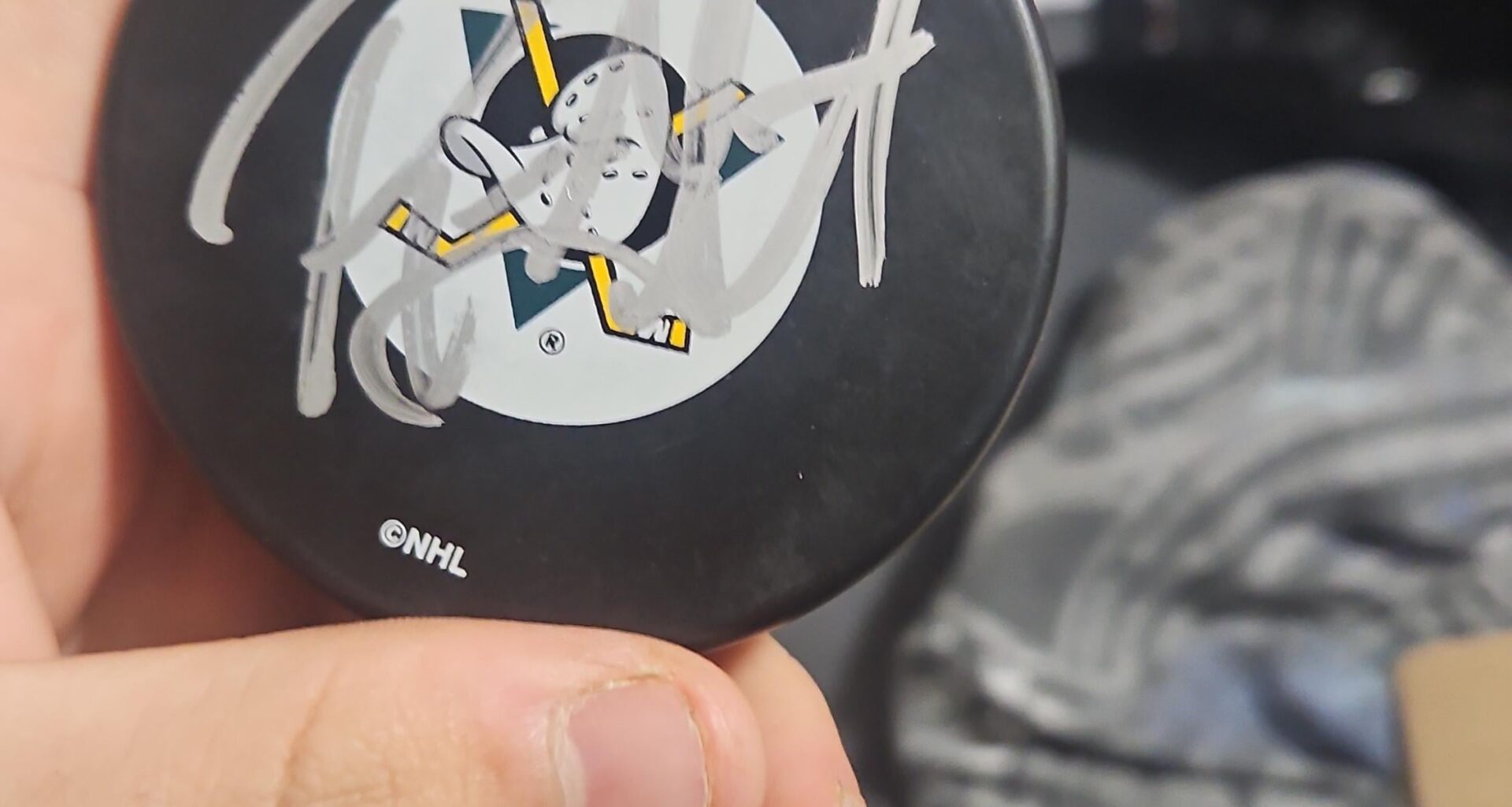 Ducks fans! Who signed this puck?