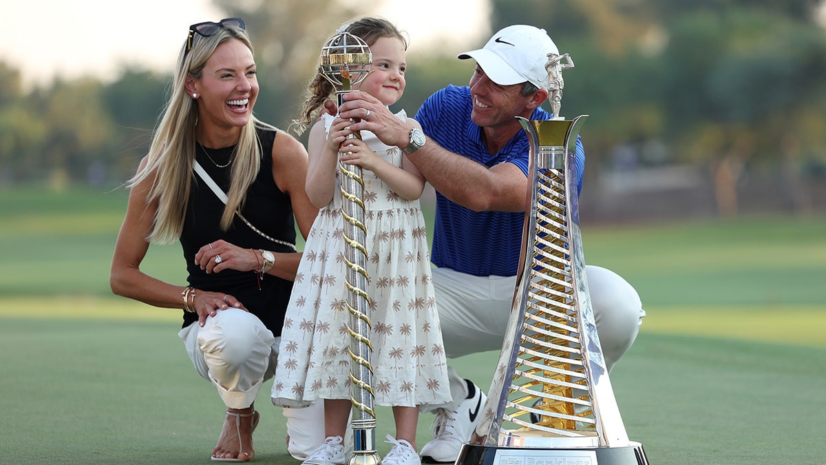 Rory McIlroy celebrates win with family