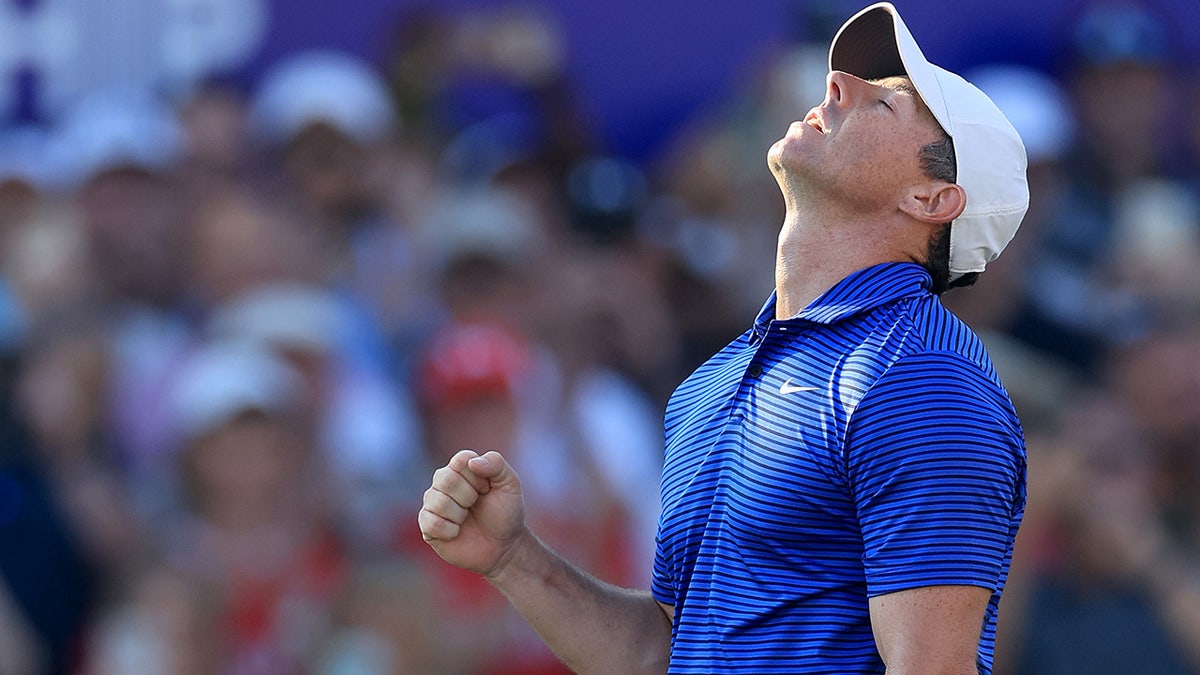 Rory McIlroy celebrates after win