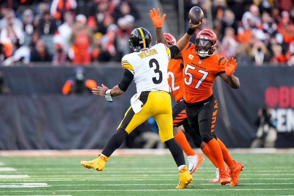 Cincinnati Bengals linebacker Germaine Pratt (57) pressures Pittsburgh Steelers quarterback Russell Wilson (3) as he throws in the fourth quarter of the NFL Week 13 game between the Cincinnati Bengals and the Pittsburgh Steelers at Paycor Stadium in downtown Cincinnati on Sunday, Dec. 1, 2024. The Steelers won 44-38.