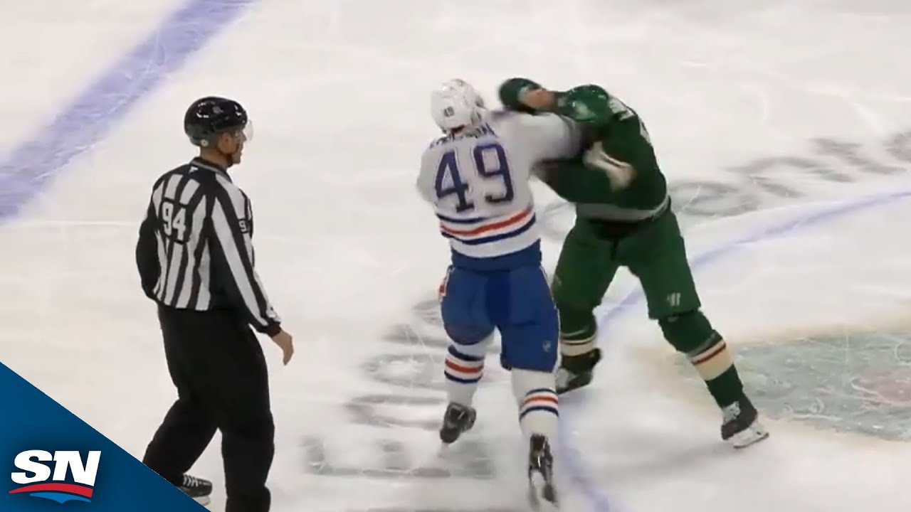 Oilers' Ty Emberson Goes Toe-To-Toe With Wild's Jakub Lauko At Centre Ice