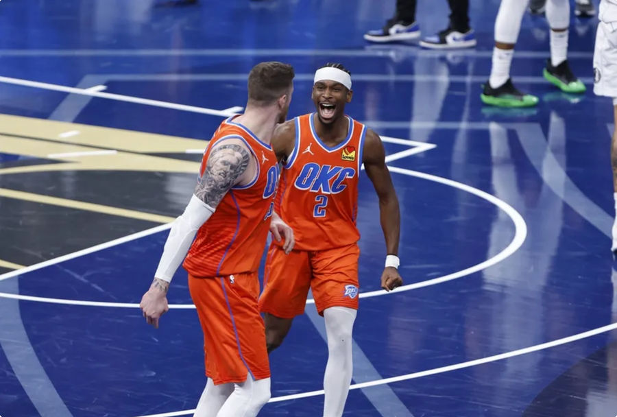 Dec 10, 2024; Oklahoma City, Oklahoma, USA; Oklahoma City Thunder guard Shai Gilgeous-Alexander (2) celebrates with center Isaiah Hartenstein (55) after he dunks against the Dallas Mavericks during the third quarter at Paycom Center. Mandatory Credit: Alonzo Adams-Imagn Images