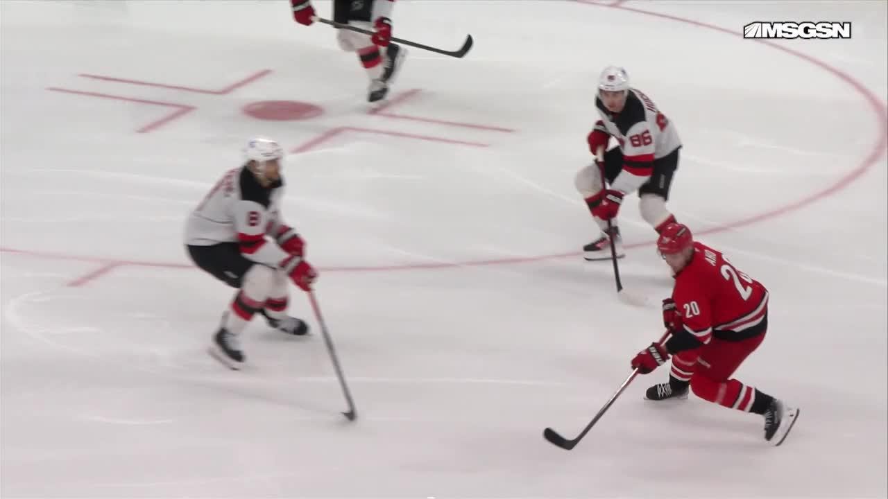 Sebastian Aho scores a goal against the New Jersey Devils