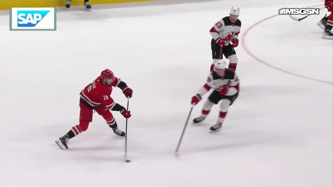 Dmitry Orlov scores a goal against the New Jersey Devils