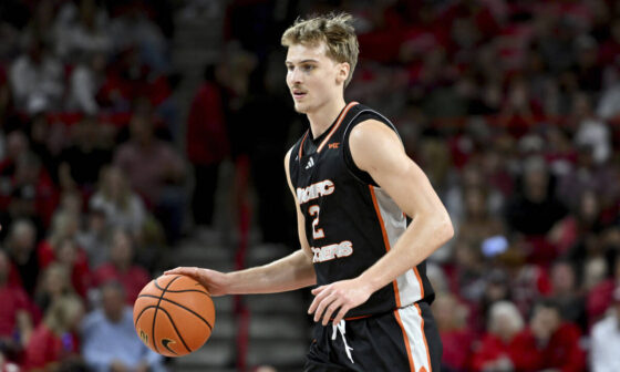 Pacific forward Elias Ralph (2) runs a play against Arkansas during an NCAA college basketball ...