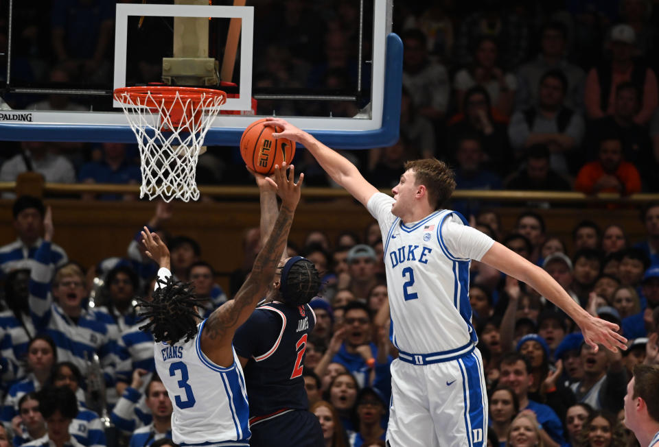 Dec 4, 2024; Durham, North Carolina, USA; Duke Blue Devils forward Cooper Flagg (2) blocks a shot by Auburn Tigers guard Denver Jones (2) during the second half at Cameron Indoor Stadium.  The Blue Devils won 84-78.   Mandatory Credit: Rob Kinnan-Imagn Images