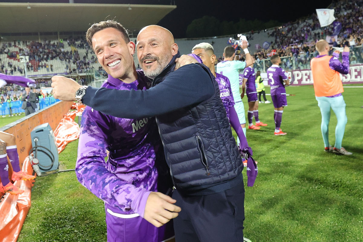 FLORENCE, ITALY - MAY 13: Head coach Vincenzo Italiano manager of ACF Fiorentina and Arthur Melo of ACF Fiorentina (on loan from Juventus) celebrate the victory after during the Serie A TIM match between ACF Fiorentina and AC Monza at Stadio Artemio Franchi on May 13, 2024 in Florence, Italy.(Photo by Gabriele Maltinti/Getty Images)