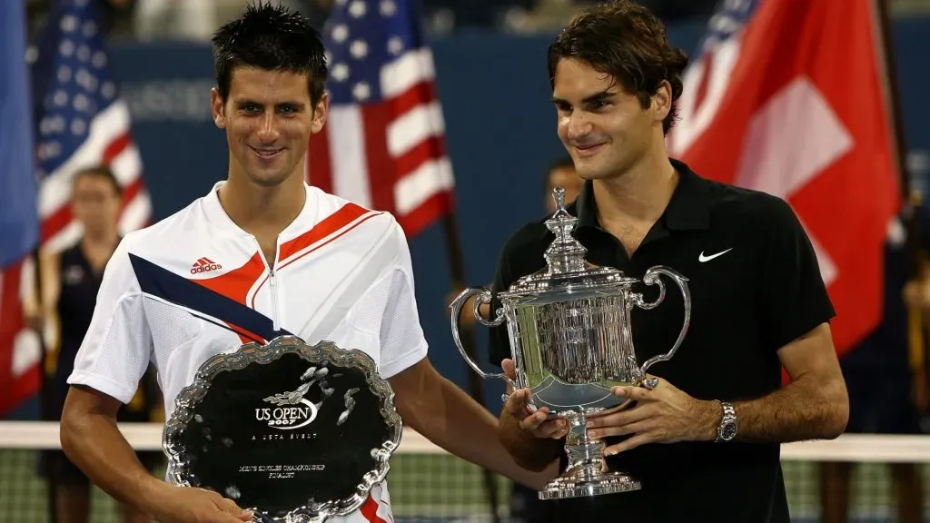 2007 U.S. Open Men’s Singles Champion Roger Federer of Switzerland and runner-up Novak Djokovic of Serbia pose for a photo after the Men’s Singles Final. (Clive Brunskill/Getty Images)