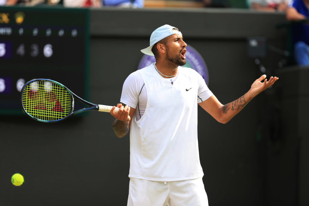 Nick Kyrgios v Cristian Garin - Nick Kyrgios complains about a decision on match point during day ten of The Championships Wimbledon 2022 at All En...