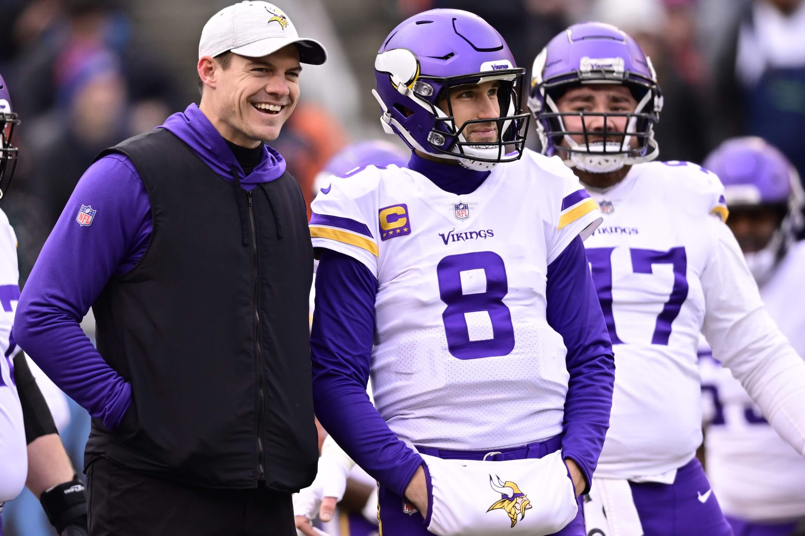 Head coach Kevin O'Connell of the Minnesota Vikings watches during warm-ups alongside quarterback Kirk Cousins prior to the game against the Chicago Bears at Soldier Field on January 08, 2023 in Chicago, Illinois.