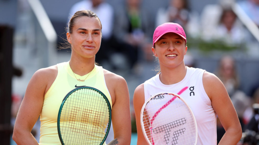 Aryna Sabalenka of Belarus and Iga Swiatek of Poland meet at the net prior to the Women's Singles Final match on Day Twelve of Mutua Madrid Open at...