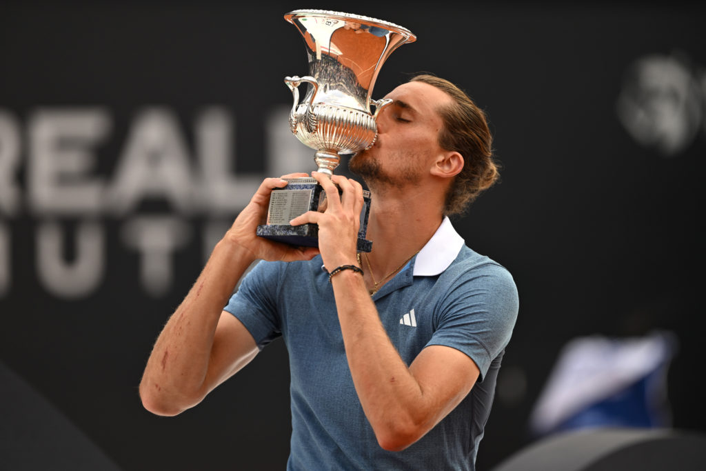 Alexander Zverev of Germany kisses the Internazionali BNL D'Italia trophy following victory against Nicolas Jarry of Chile during their Men's Singl...