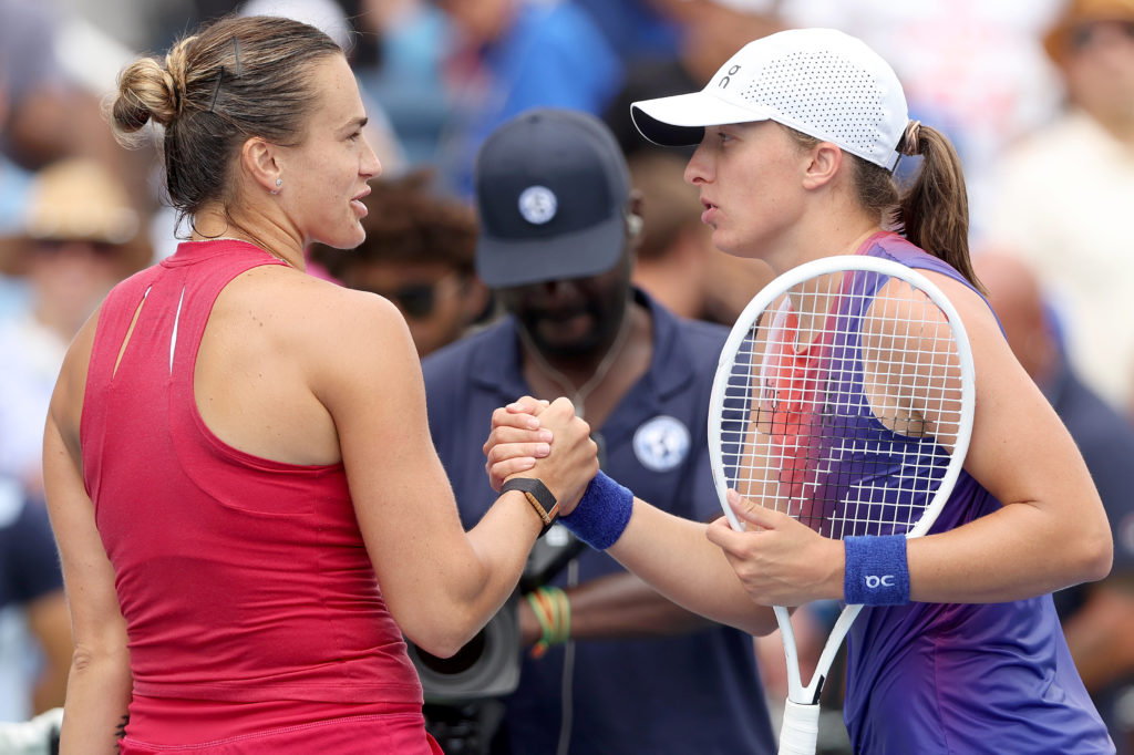 Aryna Sabalenka of Belarus is congratulated by Iga Swiatek of Poland after their match during the semifinals on Day 8 of the Cincinnati Open at the...