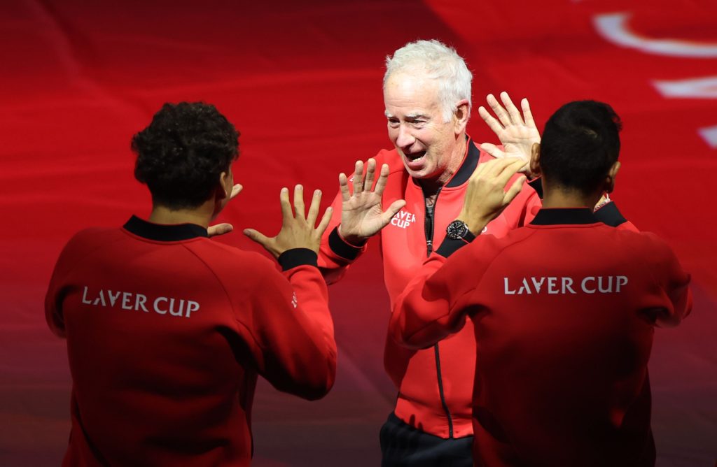 John McEnroe, Captain of Team World, reacts with Ben Shelton and Alejandro Tabilo of Team World as Team World are introduced to the crowd ahead of ...