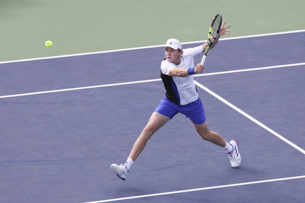 Alex Michelsen of the United States returns a shot in the Men's singles 1st Round match against Yunchaokete Bu of China on Day 5 of 2024 Shanghai R...