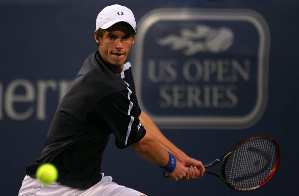 Andy Murray of Great Britain returns to Andy Roddick of the USA during their quarter final match at the 2006 Cincinnati Western & Southern Fina...