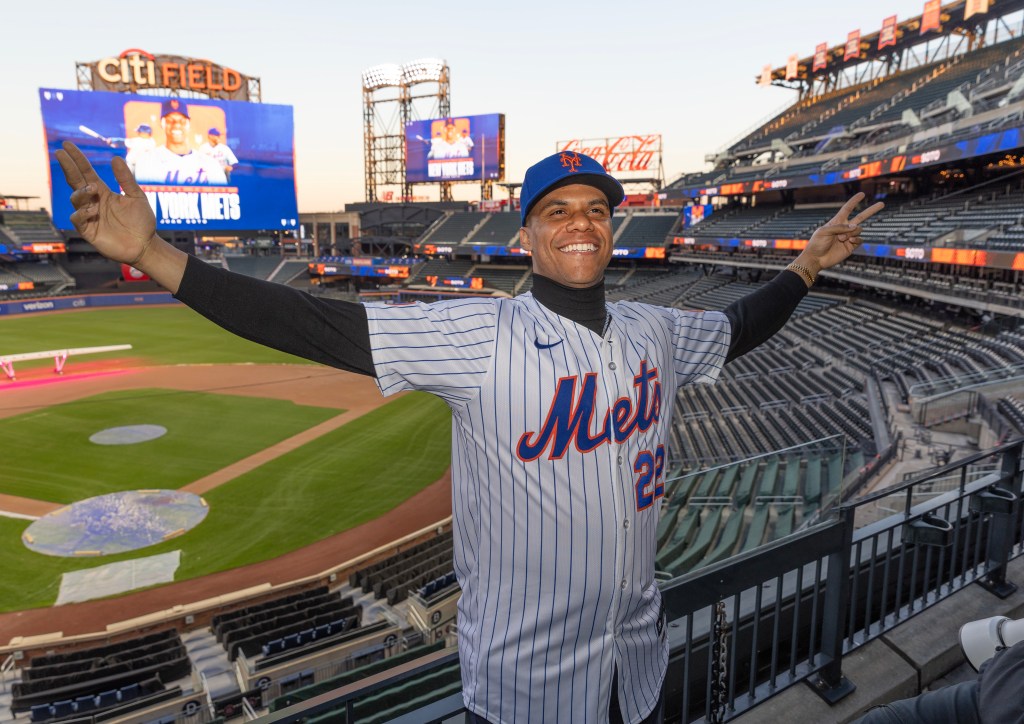 Juan Soto poses for a photo during his Mets press conference.